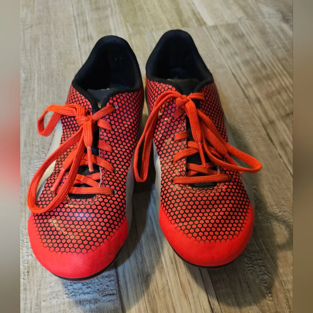 Puma Kids Soccer / football Orange, Silver and Black Cleats